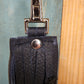 Genuine leather navy bag charm with feather
