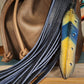 Genuine leather navy bag charm with feather