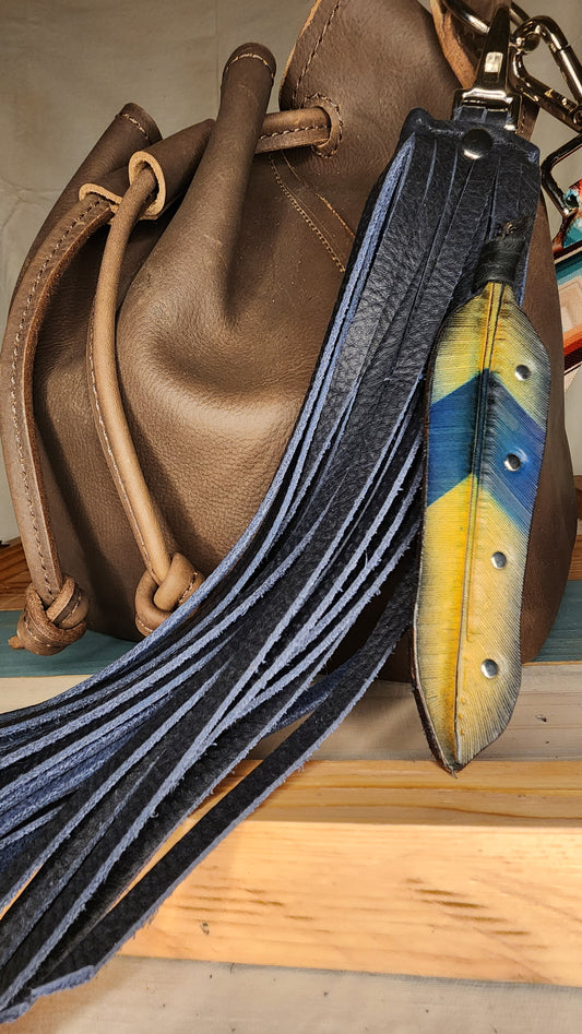 Genuine leather navy bag charm with feather