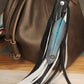 Leather black and white bag charm with turquoise feather