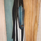 Leather black and white bag charm with turquoise feather