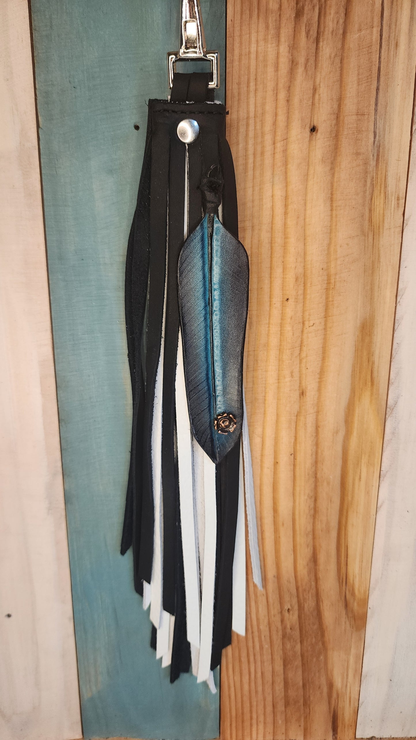 Leather black and white bag charm with turquoise feather