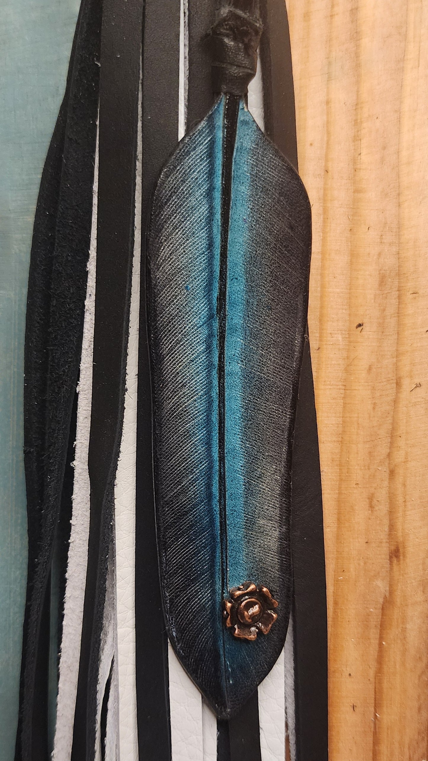 Leather black and white bag charm with turquoise feather