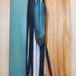 Leather black and white bag charm with turquoise feather
