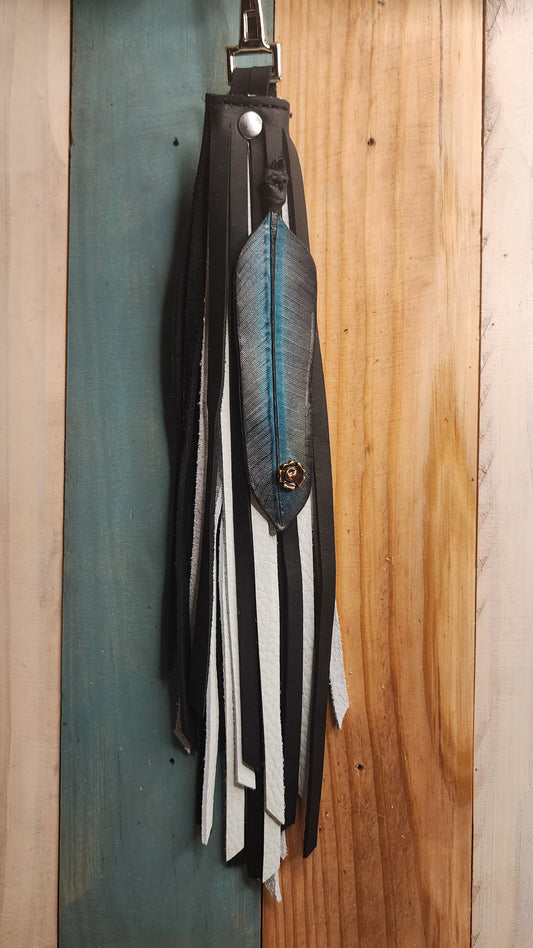 Leather black and white bag charm with turquoise feather